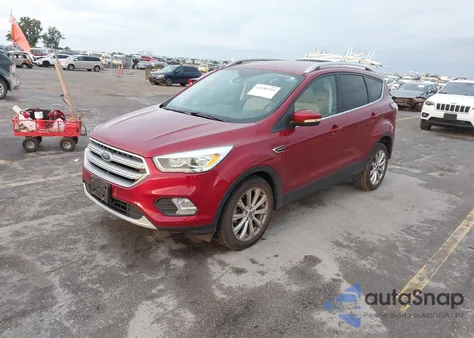 2017 Ford Escape Titanium z USA, uszkodzony, nr VIN 1FMCU0JD7HUA49313